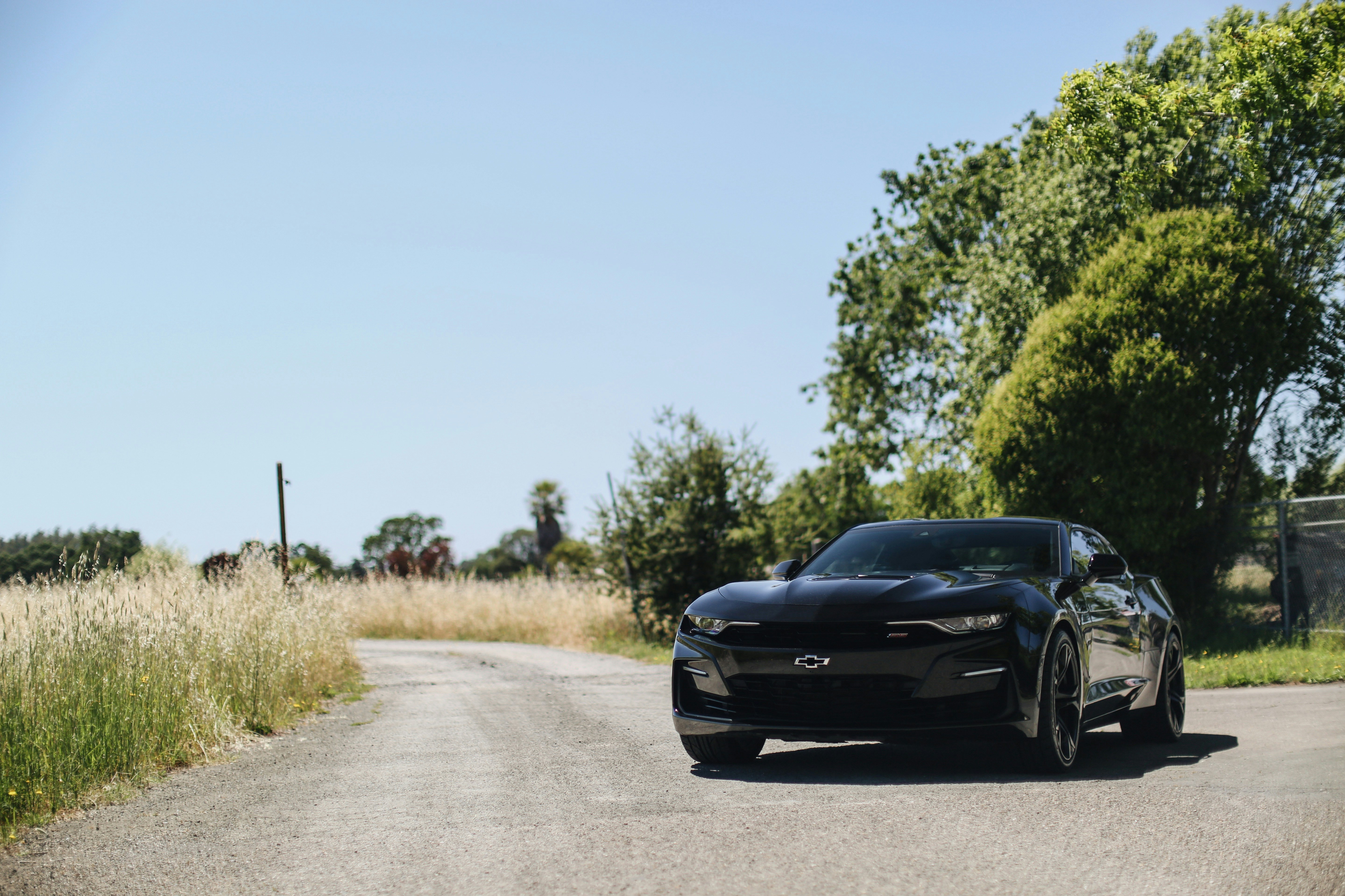 black car on road during daytime